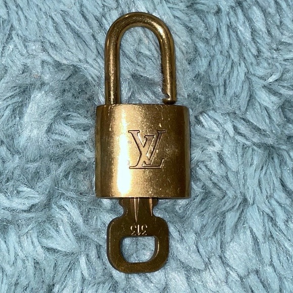 Authentic #313 LV padlock and key - Picture 1 of 4
